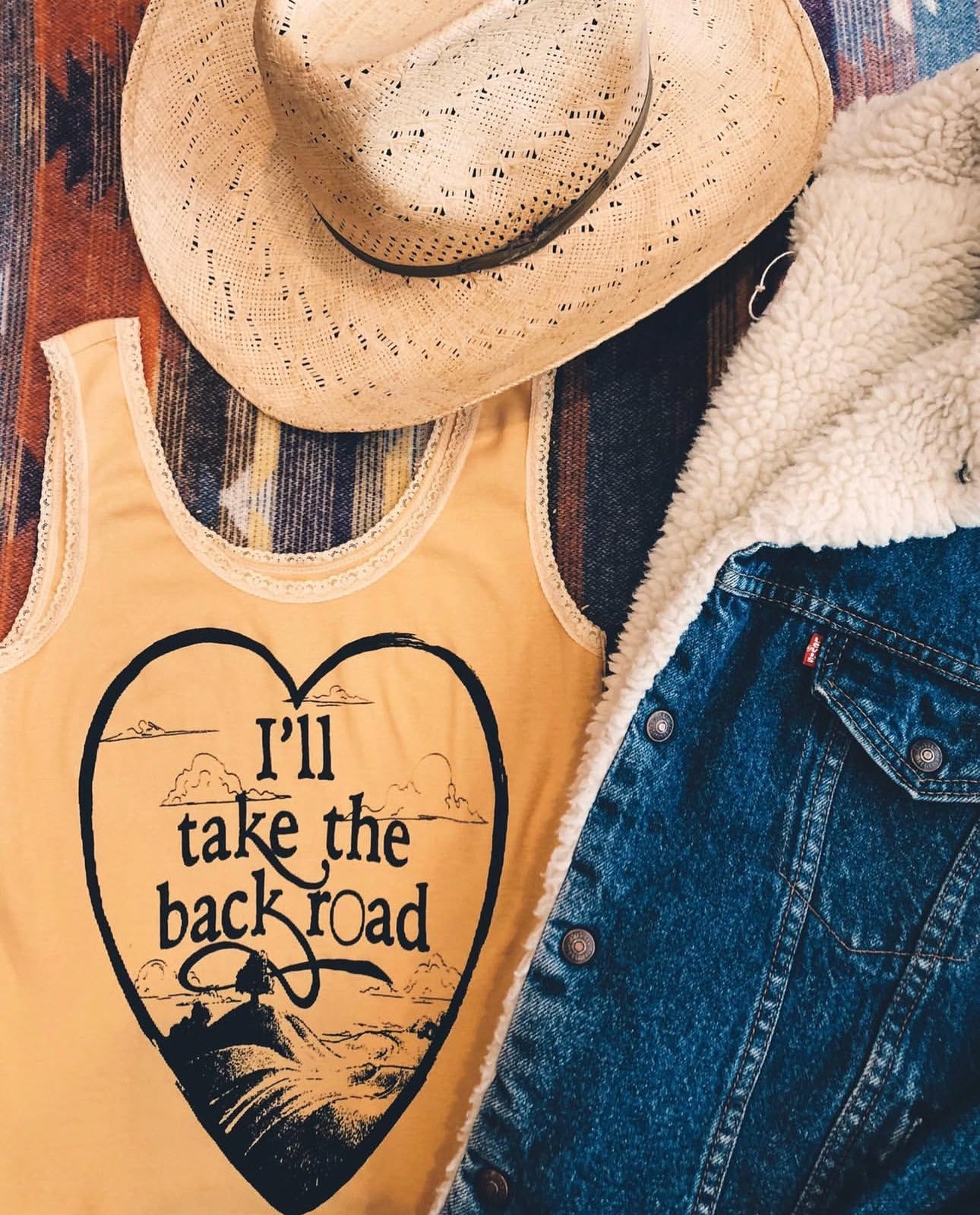 I'll take the Back Road Lace Tank Gold/Blk
